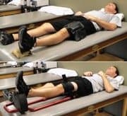 man laying down doing hyperextension exercises