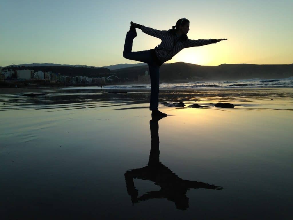 woman doing yoga balance move