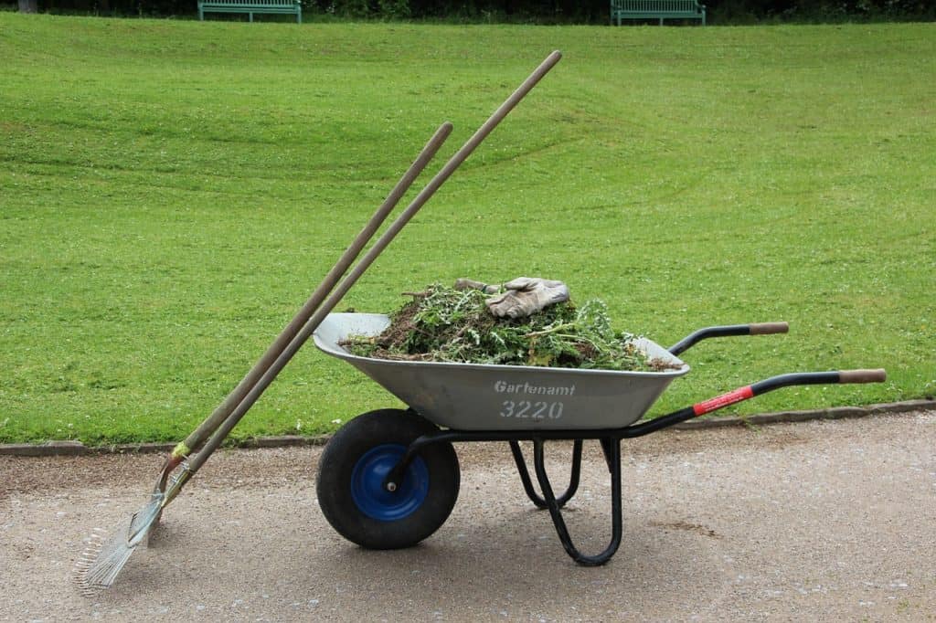 wheelbarrow and garden tools